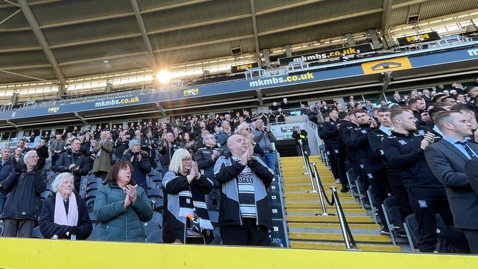 Crowd of people at a stadium stand