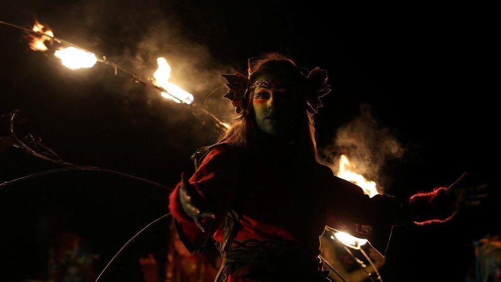 A member of the Beltane Fire Society takes part in the Samhuinn Fire Festival in Edinburgh