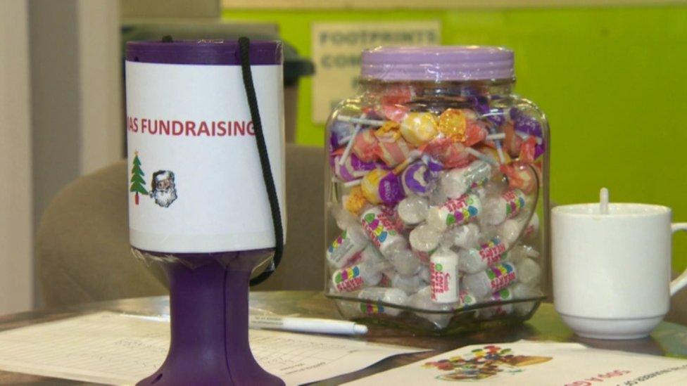 A charity collection box