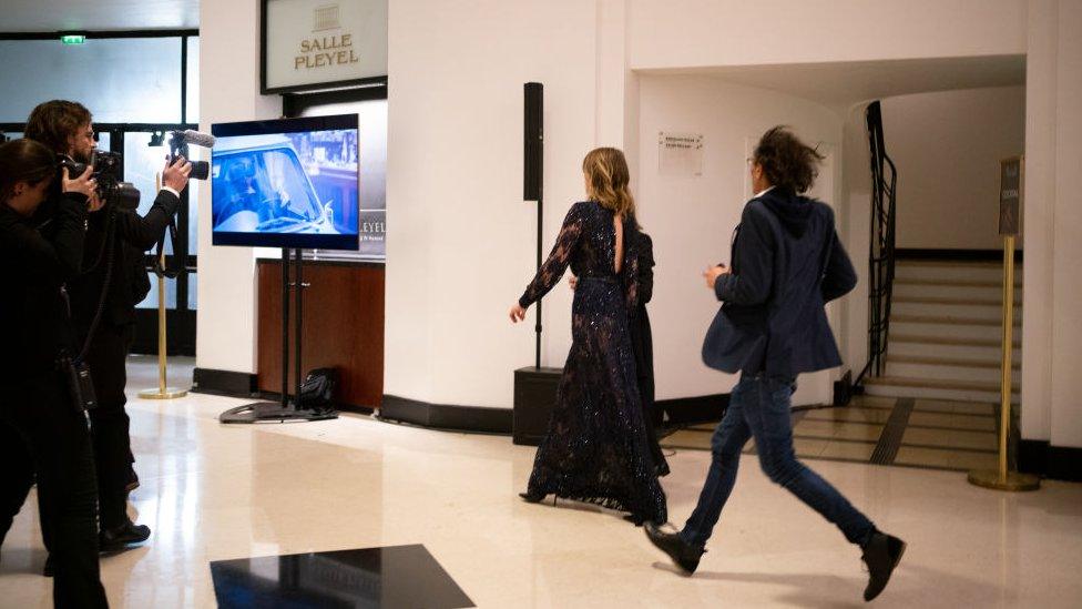 Actress Adèle Haenel leaves the Salle Pleyel after the award for best director was given to Roman Polanski