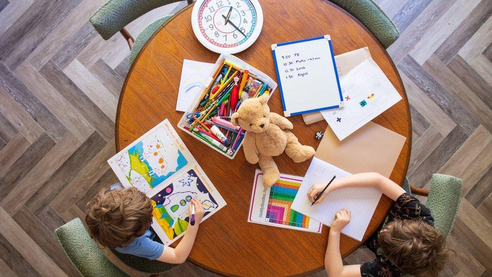 children working at desk