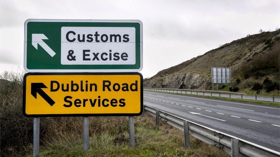 Road sign outside Newry, pointing towards an old customs and excise station near the border between Northern Ireland and Republic of Ireland