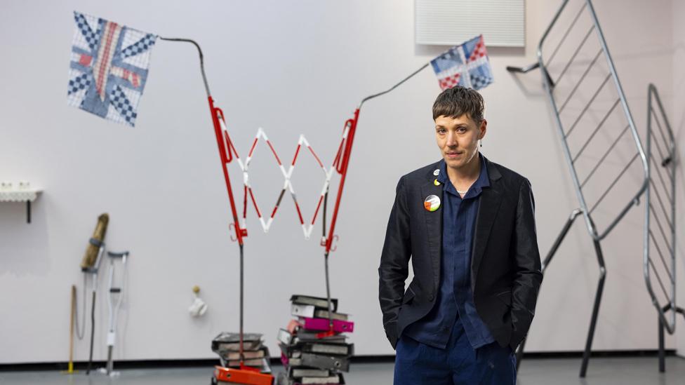 Jesse Darling ,winner of the Turner Prize 2023, with his artwork at Eastbourne's Winter Garden