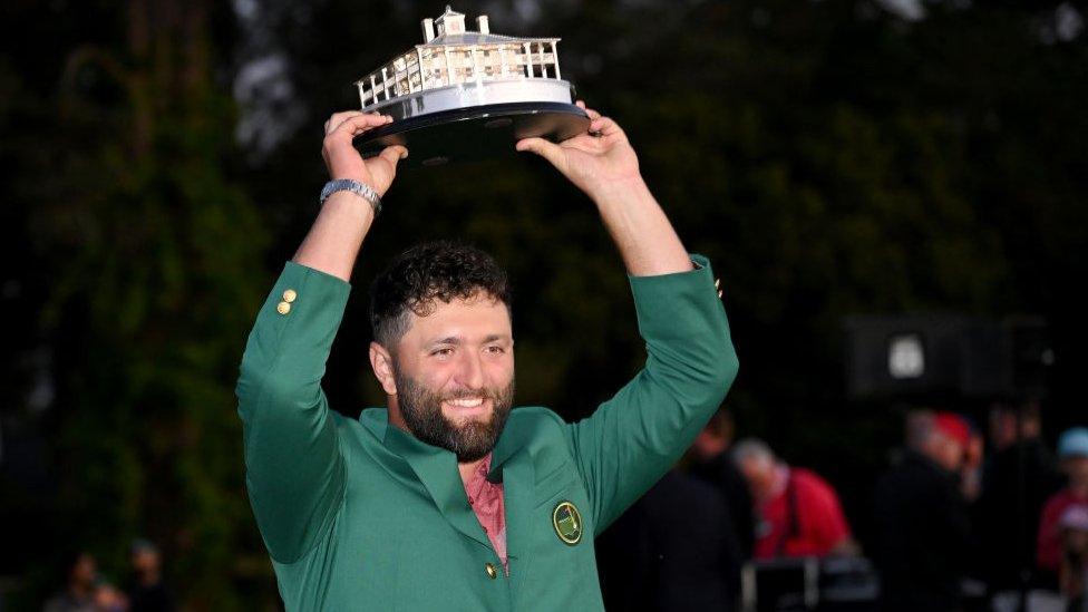 Jon Rahm of Spain poses with the Masters trophy.