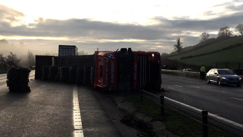 A lorry on its side on the A1