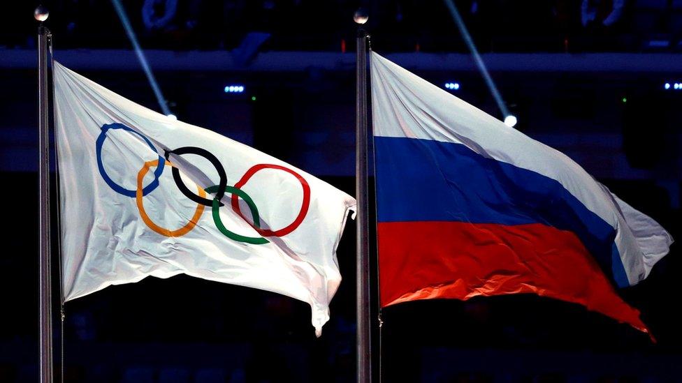 Russian flag and Olympic flag