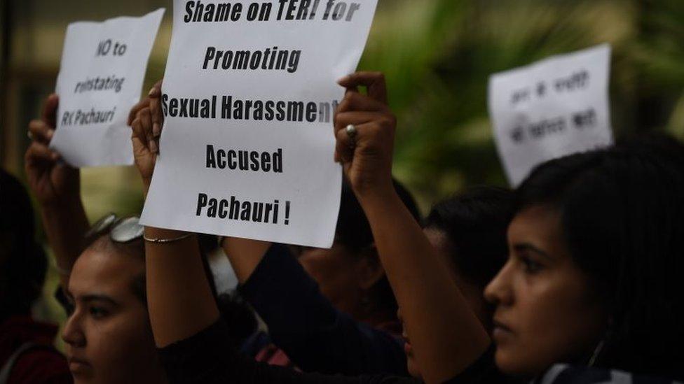 Indian protesters hold placards during a protest outside The Energy and Resources Institute (TERI) office against the Vice-Chairman R. K. Pachauri in New Delhi on February 12, 2016