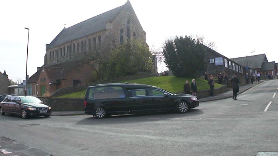 hearse arrives at church