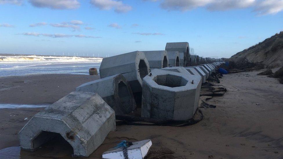 Honeycombed-shaped sea defences paid for by villagers