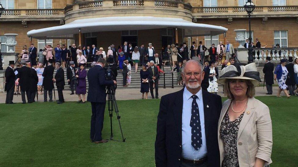 Gavin English with his daughter at Buckingham Palace