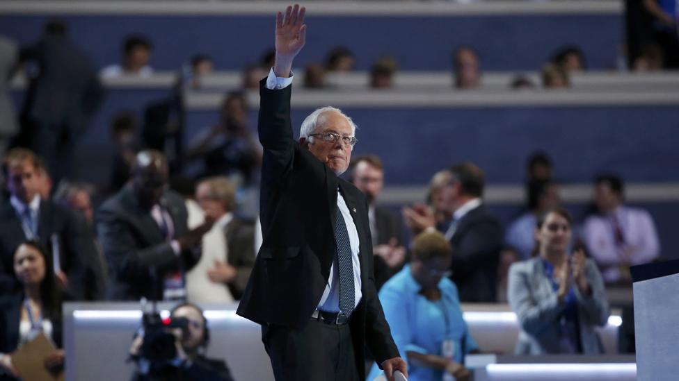 bernie sanders waves following his speech at the DNC