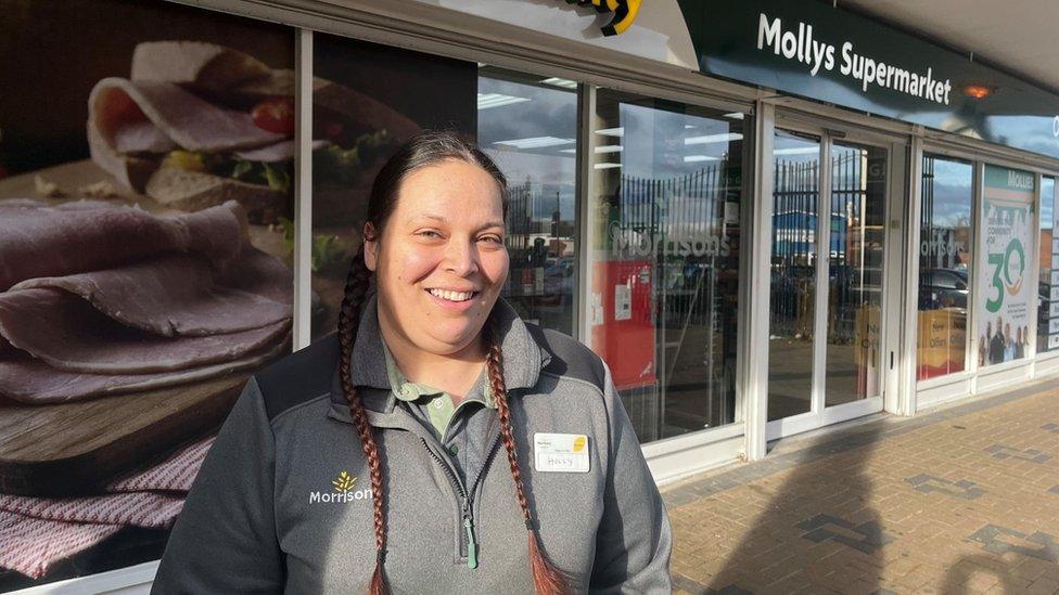 Holly Patel outside Mollys Supermarket