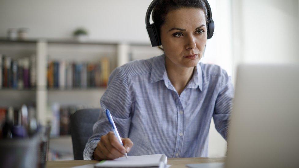 Woman using her laptop