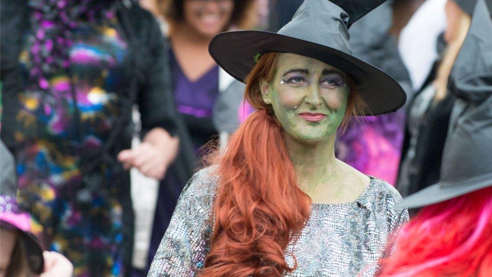 woman dressed as witch