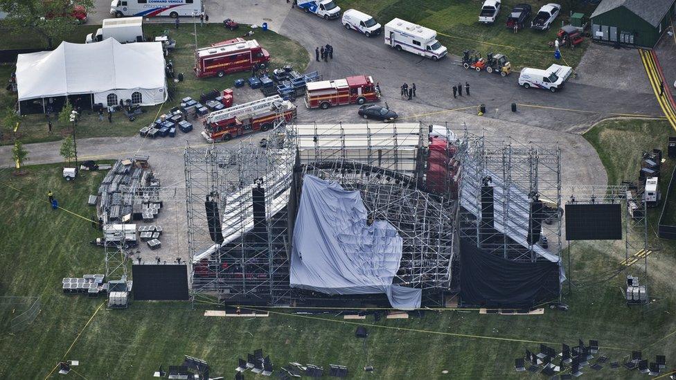 An aerial view shows a collapsed stage in Toronto's Downsview Park