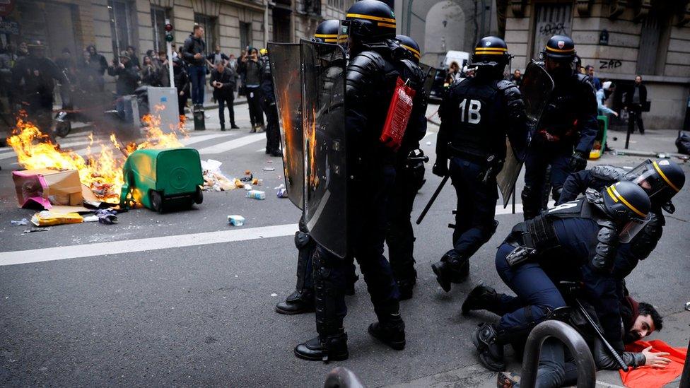 Riot police clashes with protesters during a SNCF French national railways strike in Paris