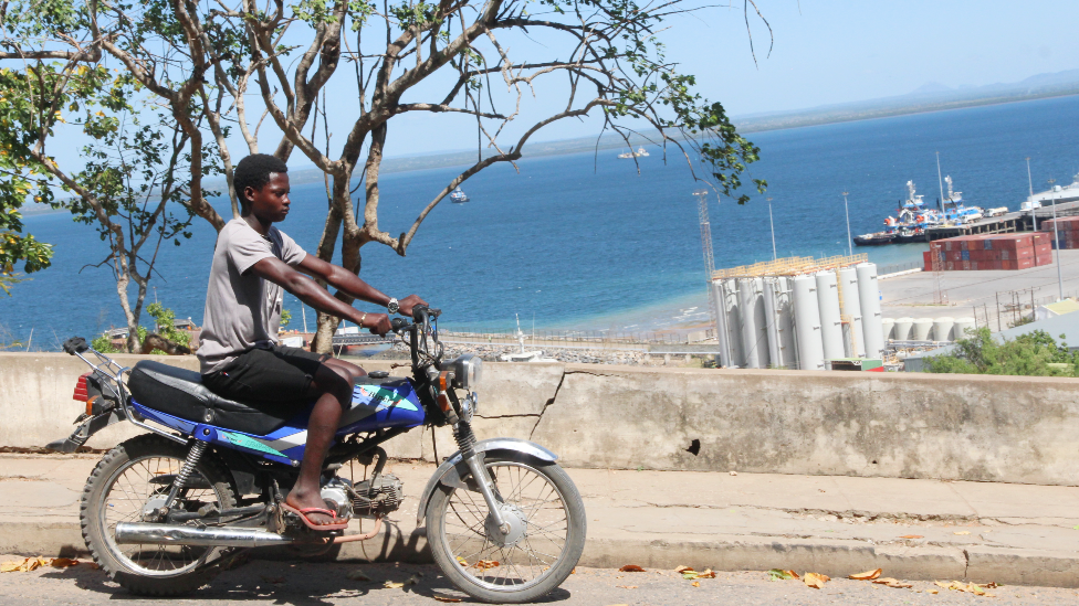 Pelé Bambina on a mota taxi in Pemba, Mozambique - May 2022