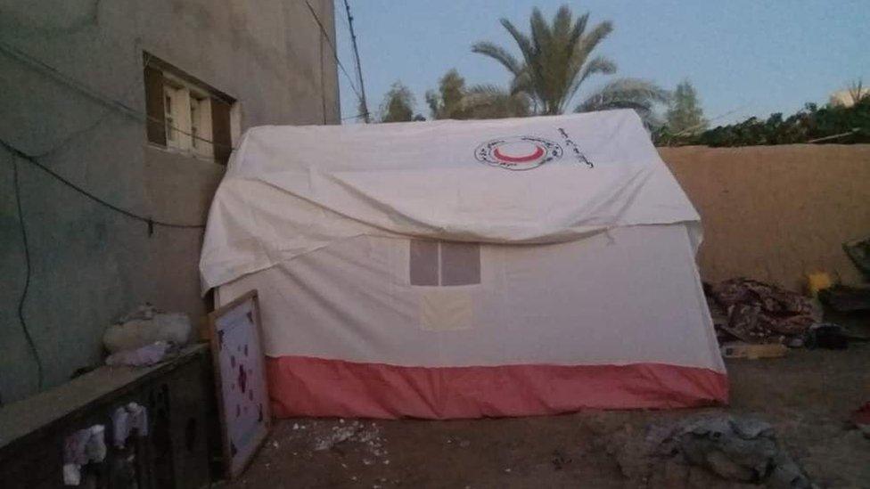 A tent in a courtyard