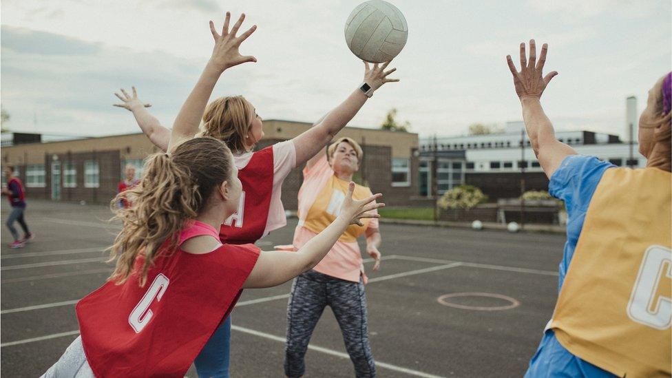 Girls playing netball