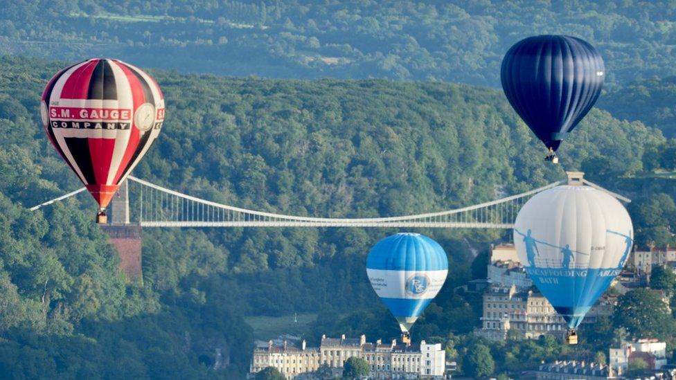 Balloons floating above Clifton's Suspension Bridge