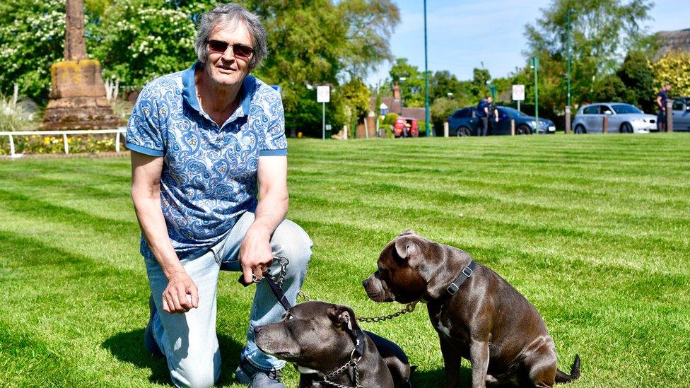 Robert McGann with his dogs