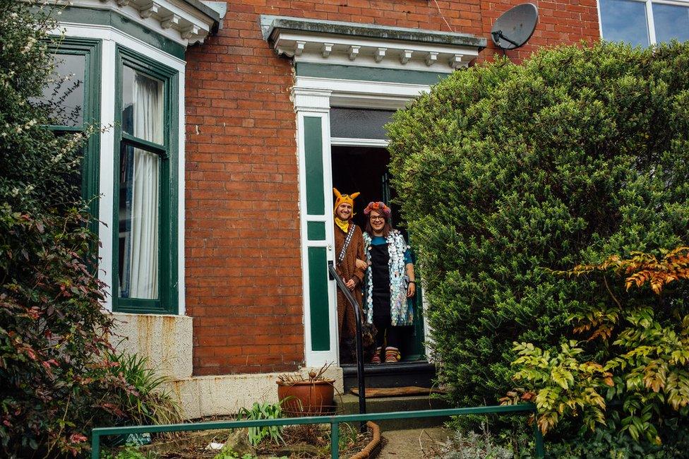 Doorstep portrait of Nick, Emily and Stitch in Sharrow Vale