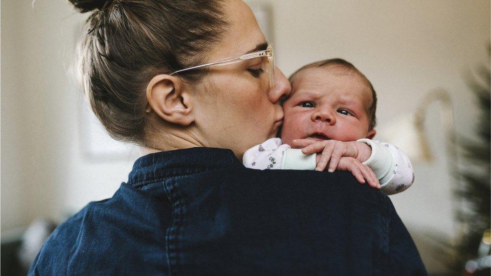 Stock image of a mum and baby