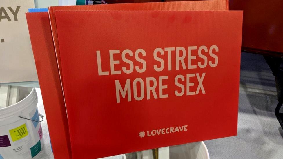 Less stress more sex sign