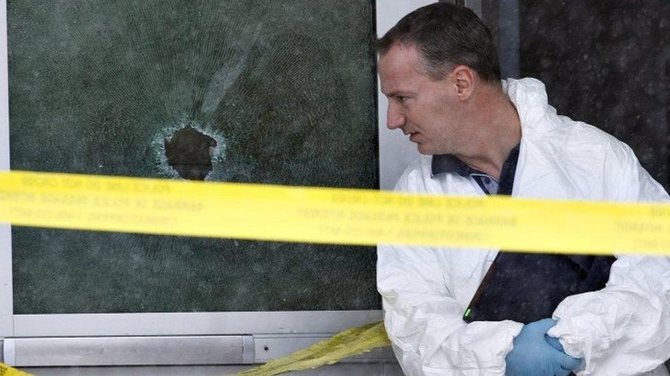 A police officer at the scene of Friday's school shooting in La Loche