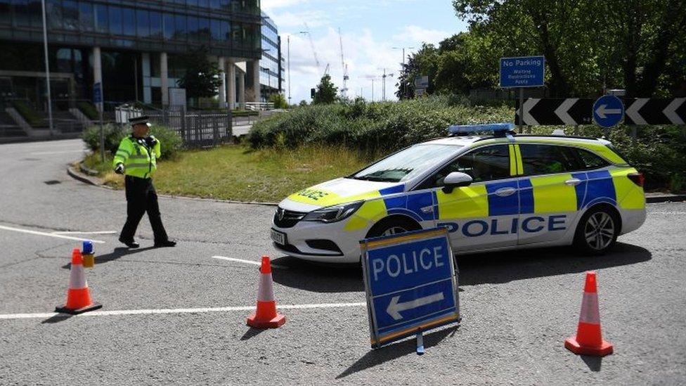 A police cordon close to the scene where three people were stabbed in Forbury Gardens in Reading,