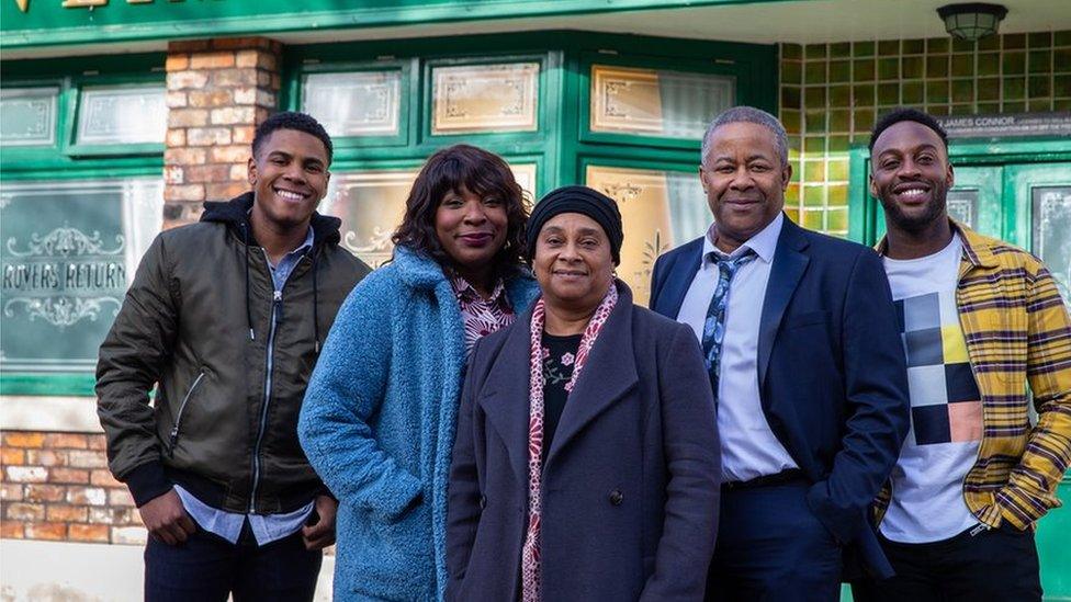 The Baileys outside the Rovers Return in Weatherfield