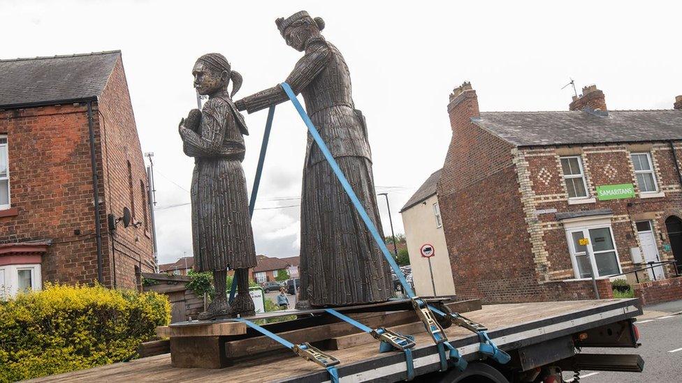 Statue of Sophia Constable and prison warden on the back of a truck