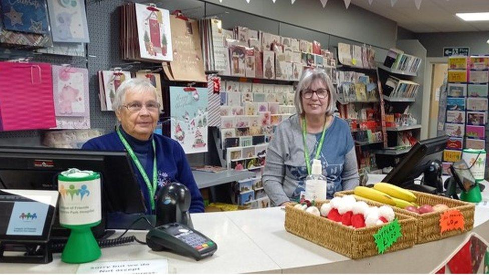 League of Friends shop in Musgrove Park Hospital with two volunteers