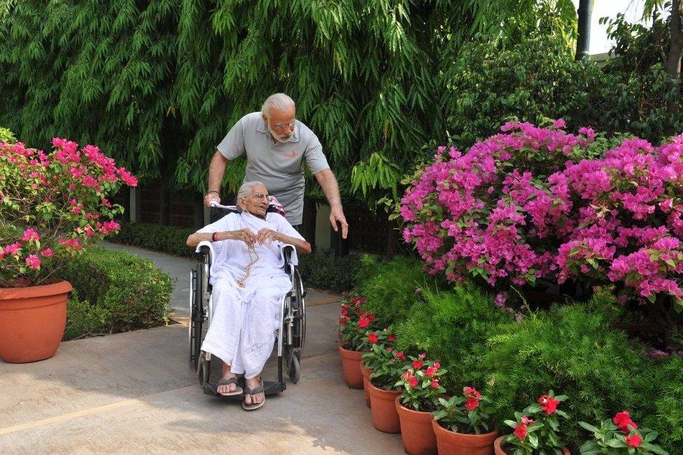 Prime Minister Narendra Modi with his mother Hiraba at the 7RCR in New Delhi during the latter's first visit to the PM's residence.