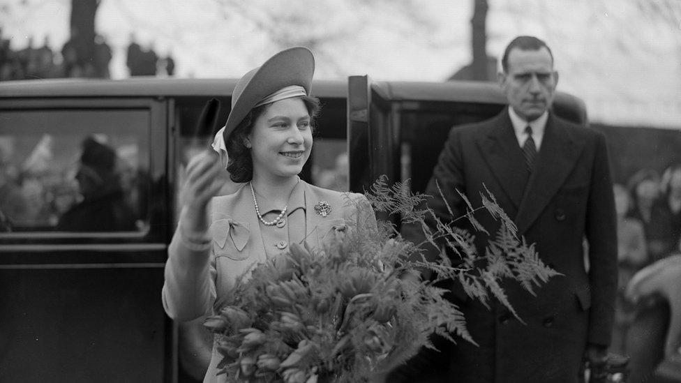 The then Princess Elizabeth waving as she arrived at Dungannon High School for Girls in County Tyrone in March 1946