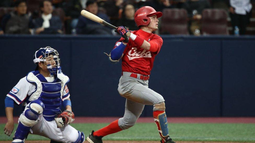 Infielder Cesar Prieto #6 of Cuba flies out in the top of fifth inning during the WBSC