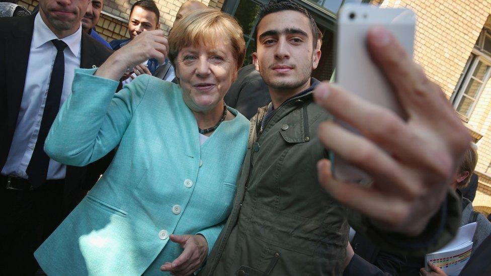 Mr Modamani in a selfie with Angela Merkel