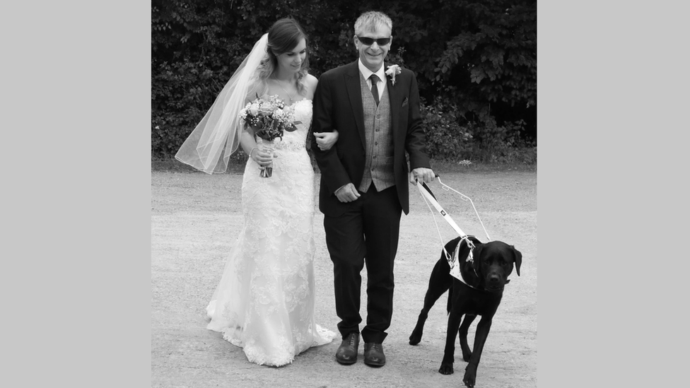 Jon Petty with his guide dog