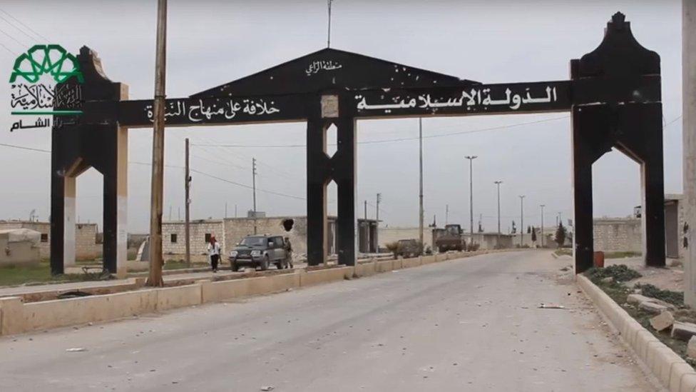 Screengrab of video posted by Islamic Front rebel group showing entrance to town of al-Rai after capture from Islamic State militants