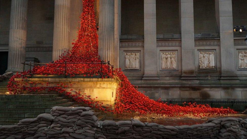 Poppies drape down St George's Hall