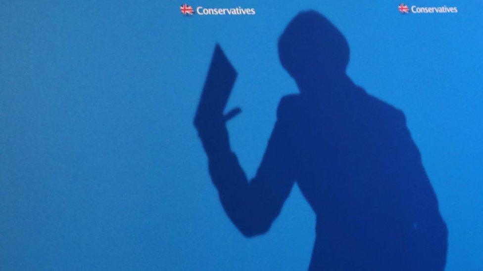 Theresa-May-shadowed-at-a-Conservative-Party-event