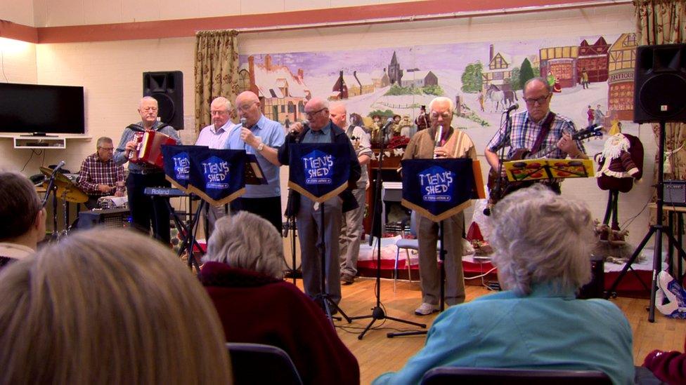 Members of Men's Shed Antrim performing