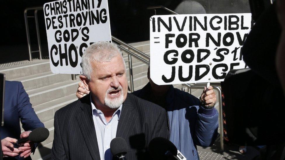 Abuse victim Peter Gogarty speaks to media in front of the court in Newcastle, Australia (14 Aug 2018)