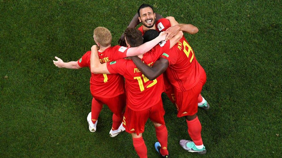 Nacer Chadli of Belgium celebrates after scoring his team's third goal with team mates during the 2018 FIFA World Cup Russia Round of 16 match between Belgium and Japan