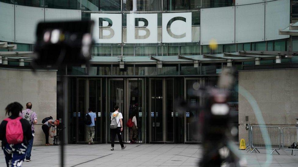 Picture of people walking into BBC's Broadcasting House in central London