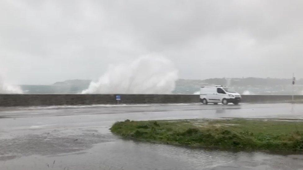 Waves spill on to roads in Guernsey