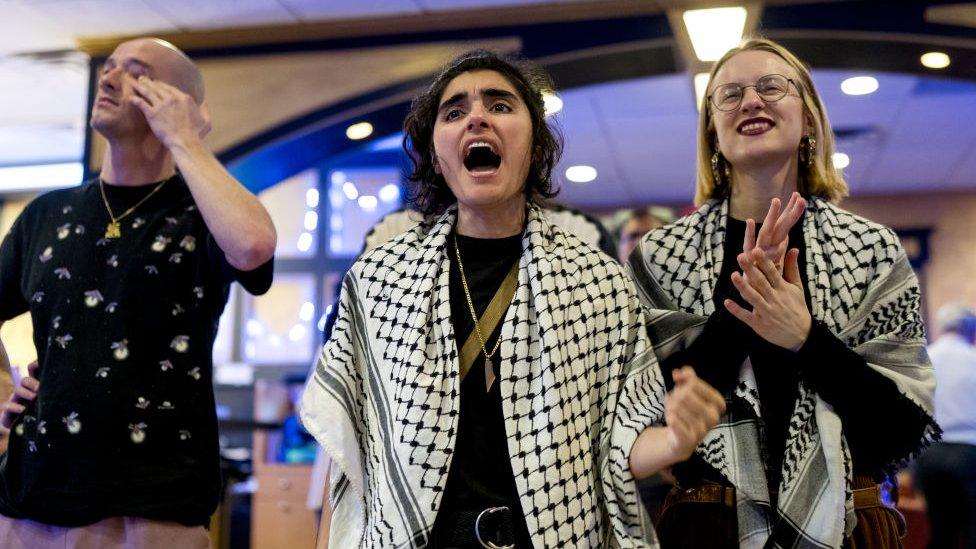 Activists from the Listen to Michigan campaign cheered as election results came in