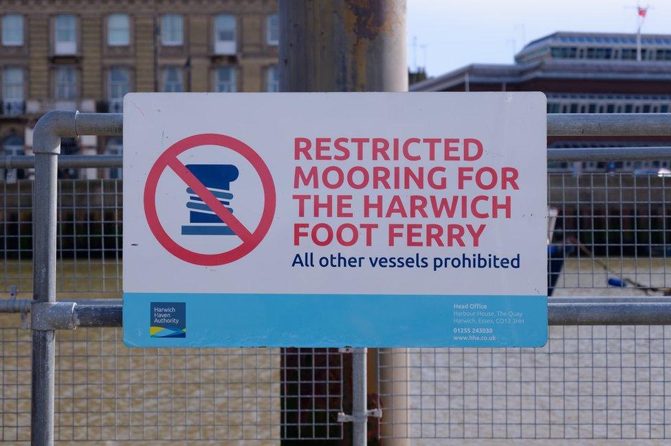 Sign for the foot ferry at Harwich. The Pier Hotel is in the background