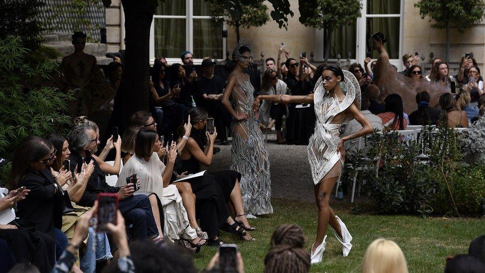 A model walks the runway during the Iris Van Herpen's show