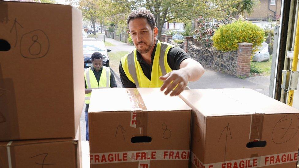 Men unloading a lorry